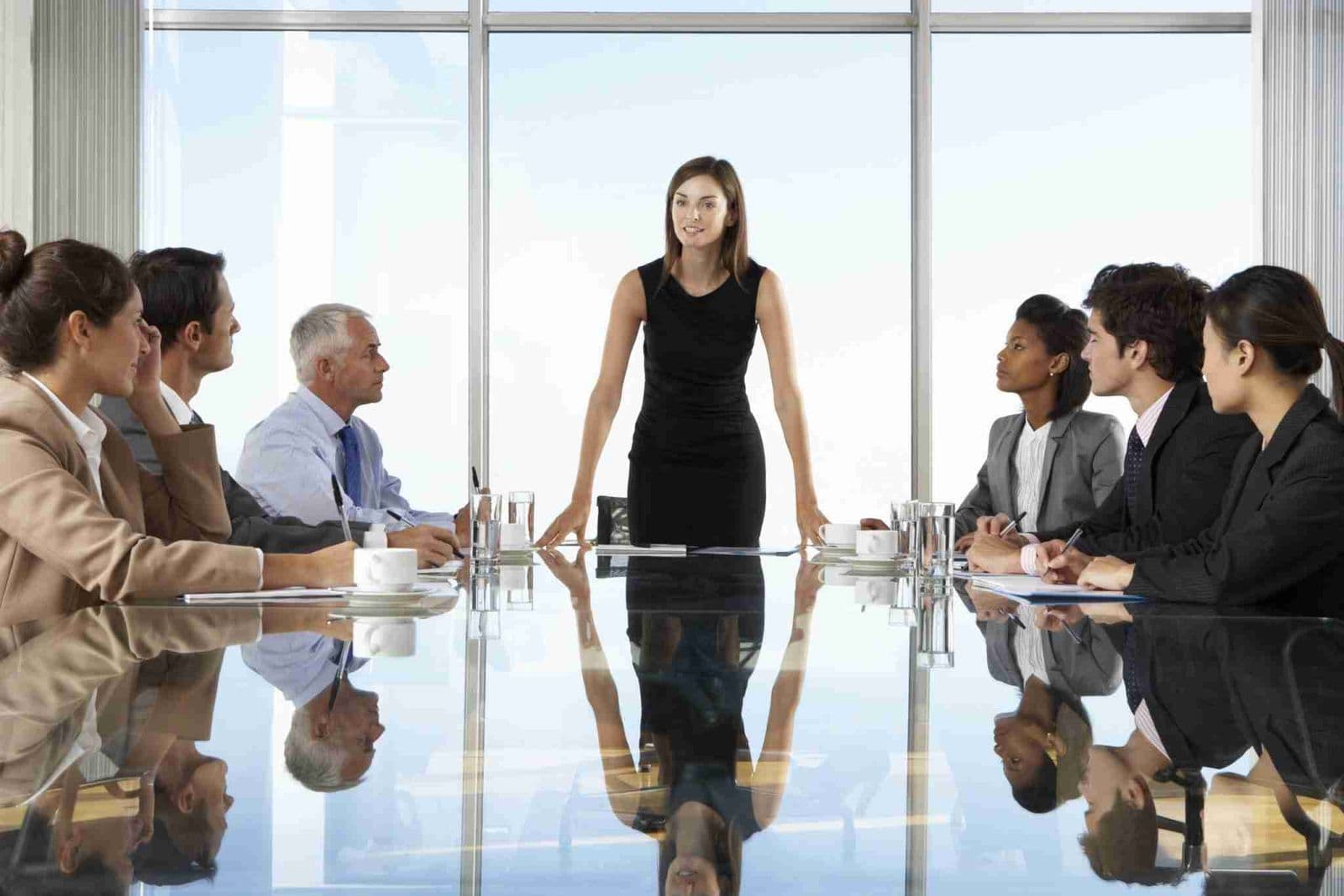 Group Of Business People Having Board Meeting