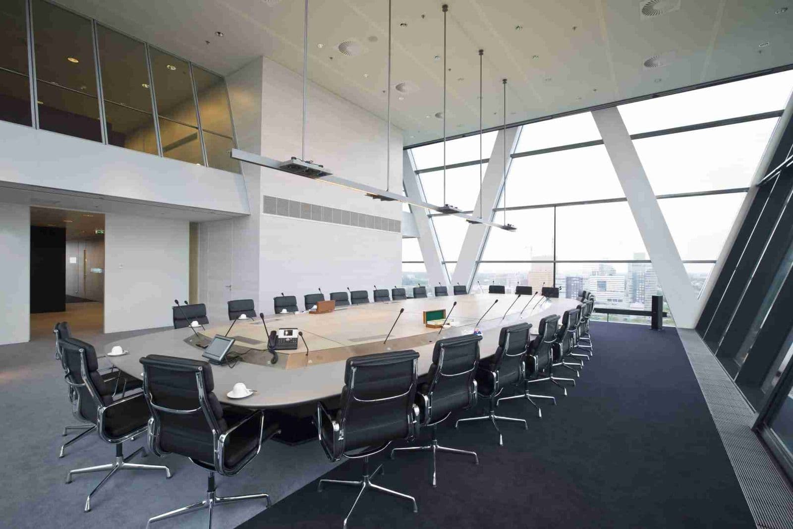 Luxurious board room with meeting table and chairs